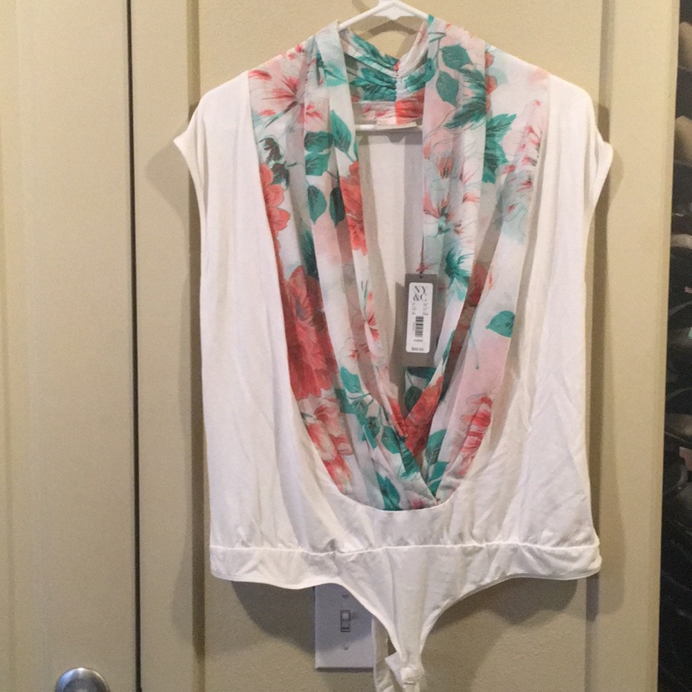 Eva mended New York and company unitard blouse